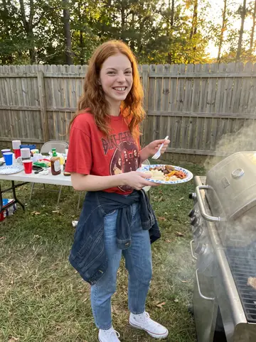 Shannon, AI character: a friend's backyard cookout in Raleigh during a Carolina barbecue argument she is not qualified to join