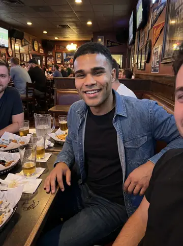 Brandon, AI character: low-key Minneapolis sports bar after an away-game watch party, teammates cropped around the booth