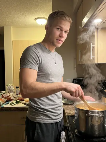 Bjørn, AI character: his apartment kitchen at night, a big stock pot on the stove and simple groceries spread across the counter
