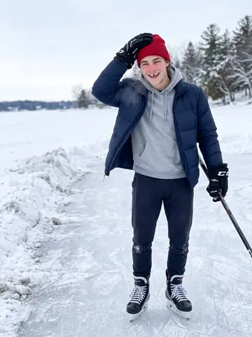 Teddy, AI character: a frozen inlet of Lake Ontario outside Kingston over Christmas break, a shoveled pond rink and snowbanks