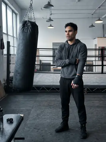 Menelaos, AI character: a closed boxing gym in Queens at 6 a