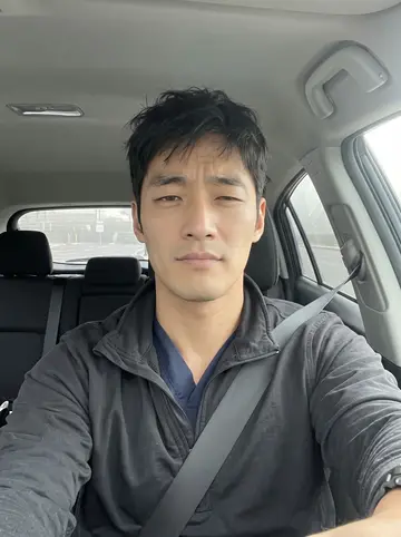 Tae, AI character: parked car before an early paramedic class in Los Angeles morning marine layer