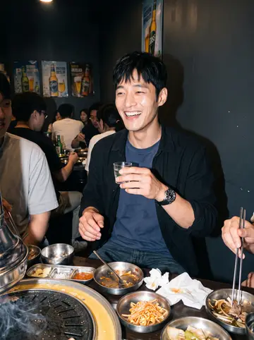Tae, AI character: busy Koreatown barbecue table after class with classmates partly cropped around him