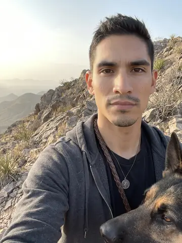 Santiago, AI character: Franklin Mountains trailhead off Transmountain Road in El Paso at dawn, rocky desert slope and dry scrub…