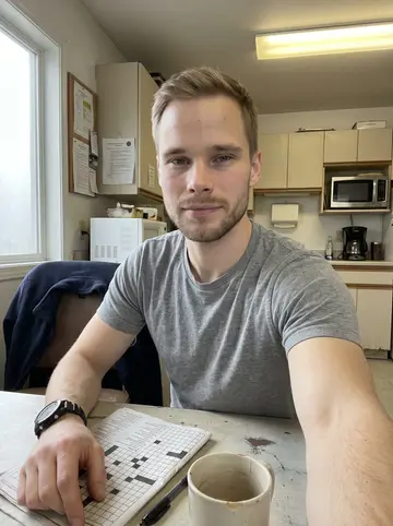 Danny, AI character: the EMS station kitchen table on a foggy morning after a long shift, crossword folded beside a chipped mug