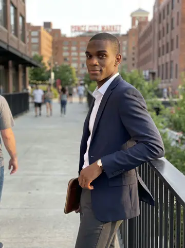 Marvin, AI character: Atlanta BeltLine near Ponce City Market at golden hour, leaning against a black metal railing with the…
