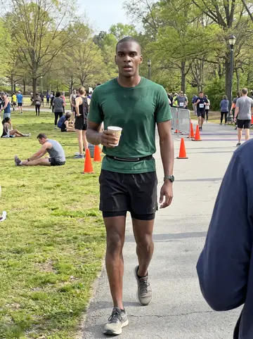 Marvin, AI character: Piedmont Park on a bright spring morning after a community 5K, grass and runners stretching in the background