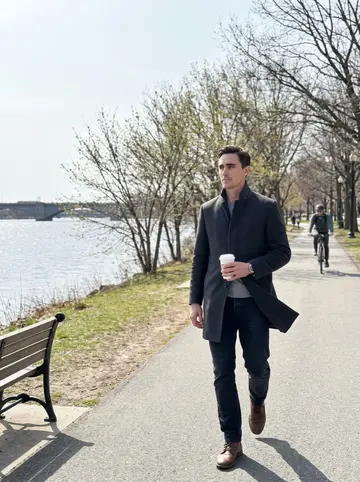 Matthew, AI character: the Charles River Esplanade on a bright spring morning, bare branches just starting to green