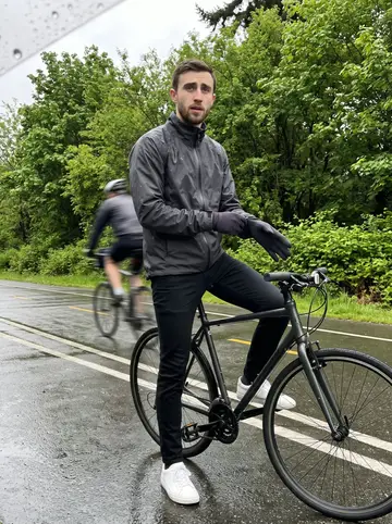 Steven, AI character: Burke-Gilman trail after a spring shower, wet pavement, green trees and bike lane markings