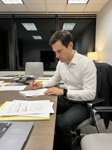 Drake, AI character: late evening in a downtown Chicago conference room after a creditor call, papers and laptop on the table