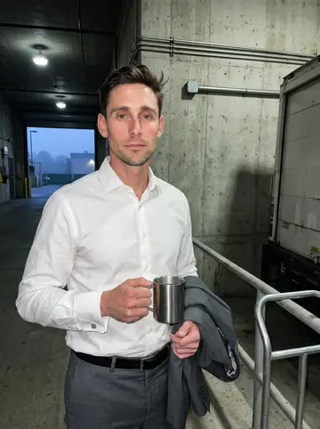 Bruce, AI character: hospital loading dock in Houston at 5 a