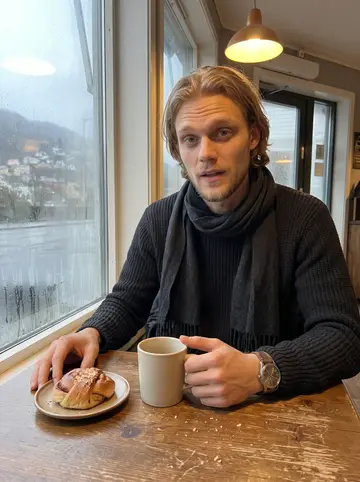 Fredrik, AI character: a small Bergen bakery just after dawn, rain-fogged window behind him and a cardamom bun on the table