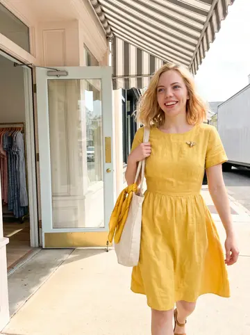 Katherine, AI character: King Street in Charleston, just outside her freshly refitted clothing boutique with pastel storefronts…