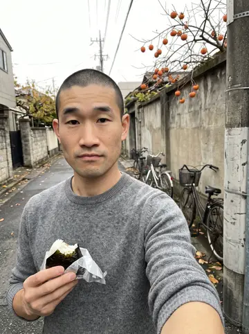 Kenji, AI character: the narrow back alley behind his apartment building in Shizuoka, near the bike racks and a glowing vending…