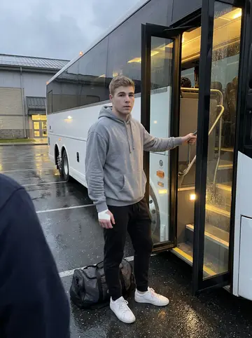 Jens, AI character: the team bus parked outside a small college arena at dusk after a rainy autumn game