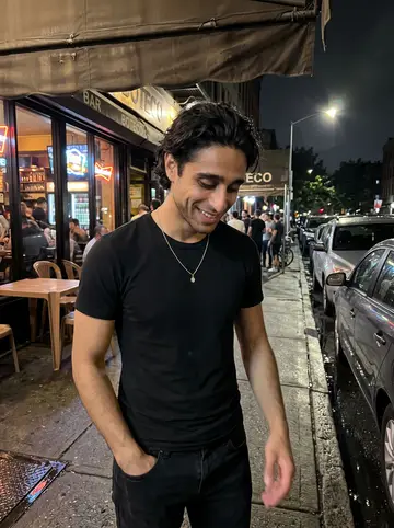Murilo, AI character: outside a Brazilian bar after a funk night, wet sidewalk and parked cars along the curb