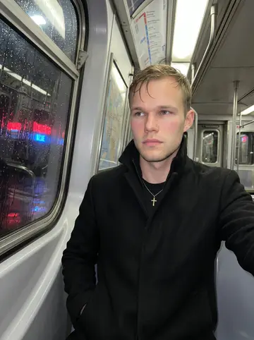 Vitaly, AI character: inside the small dog grooming shop, near the stainless grooming table and shelves of shampoo bottles