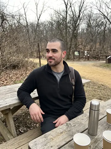 Luis, AI character: on the concrete front steps of the Hunting Park rec center after Tuesday boxing, a metal railing and a…