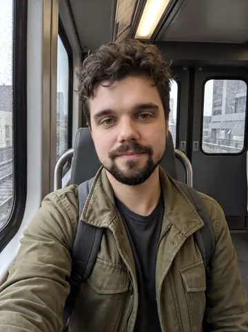 Jovan, AI character: inside a Calgary CTrain car on a rainy morning commute, wet windows and grey buildings sliding past behind him