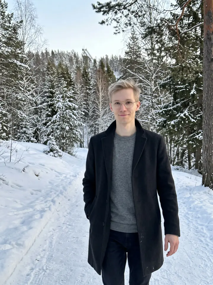 Eero, AI character: the snowy path above Pyynikki ridge in Tampere, old ski-jump tower blurred far behind him