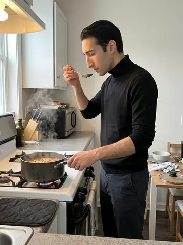 Christopher, AI character: small Revere apartment kitchen after his shift, pot of pasta e fagioli on the stove and a plain kitchen…