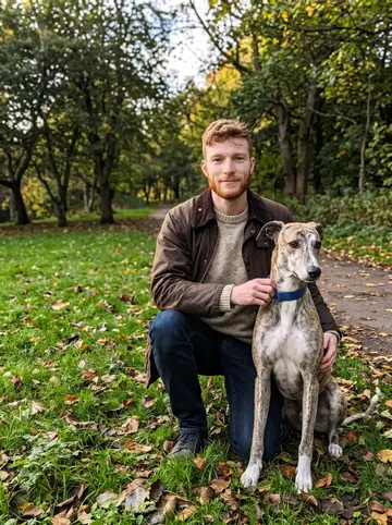 Benedikt, AI character: Kelvingrove Park in Glasgow, on the grass near the tree line with Biscuit sitting beside him