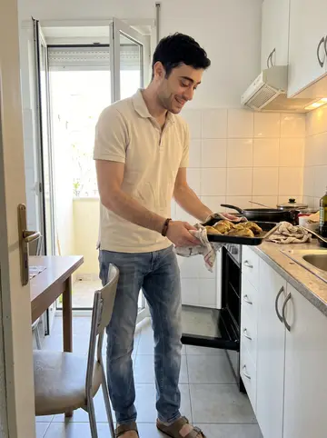 Stelios, AI character: his grandmother's compact apartment kitchen, white tile wall, small balcony door open, a baking dish of…