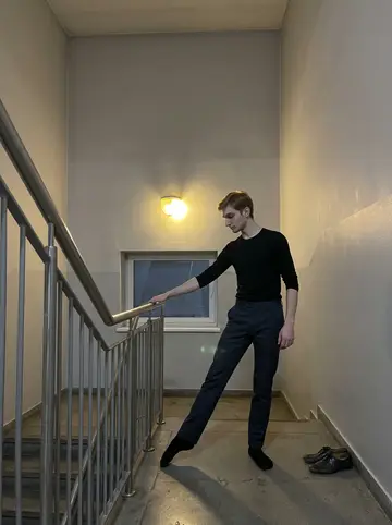 Yegor, AI character: the empty hospital stairwell at about 3 a