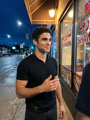 Idris, AI character: outside a Dearborn shawarma spot after a late soccer match on the radio, standing with cousins just out of…