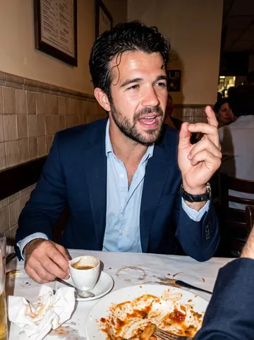 Pierpaolo, AI character: a crowded North End trattoria after a late dinner, small table with espresso cups and pasta plates, warm…