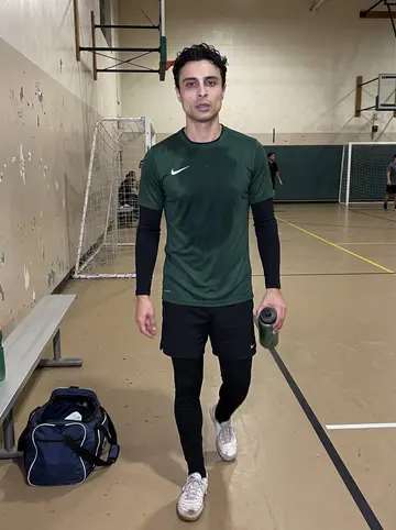 Matheus, AI character: a rec gym in Newark's Ironbound after Thursday night futsal