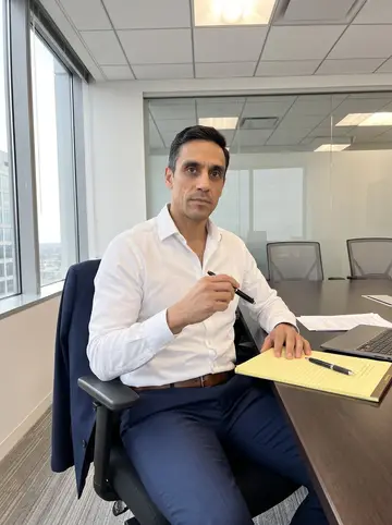 Jhon, AI character: law firm conference room high above downtown Miami, early morning before other people arrive