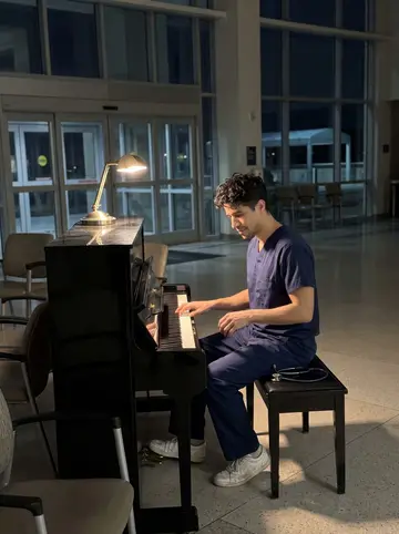 Ruairí, AI character: the hospital atrium at 4 a