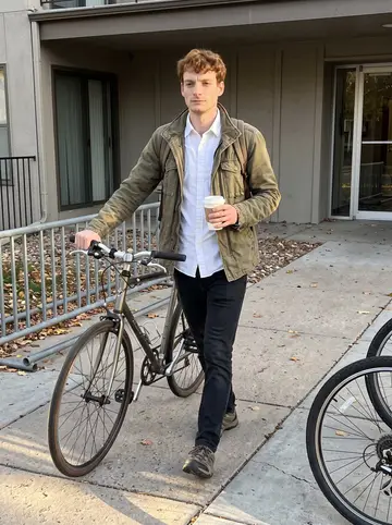 Warren, AI character: a bike rack outside his Denver apartment building on a crisp weekday morning