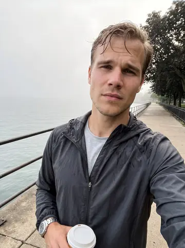 Finley, AI character: the lakefront path near Lincoln Park just after a 6 a