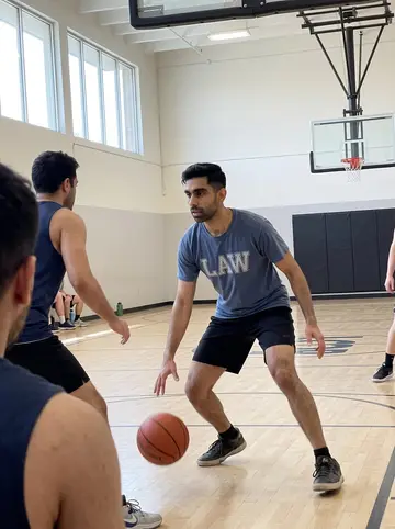 Fadi, AI character: a Loop gym during Wednesday pickup basketball, bright daylight coming through high windows