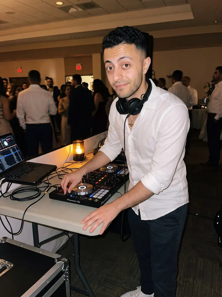 Mehdi, AI character: a small Persian wedding reception in Irvine, beside a DJ controller and laptop on a folding table, guests…